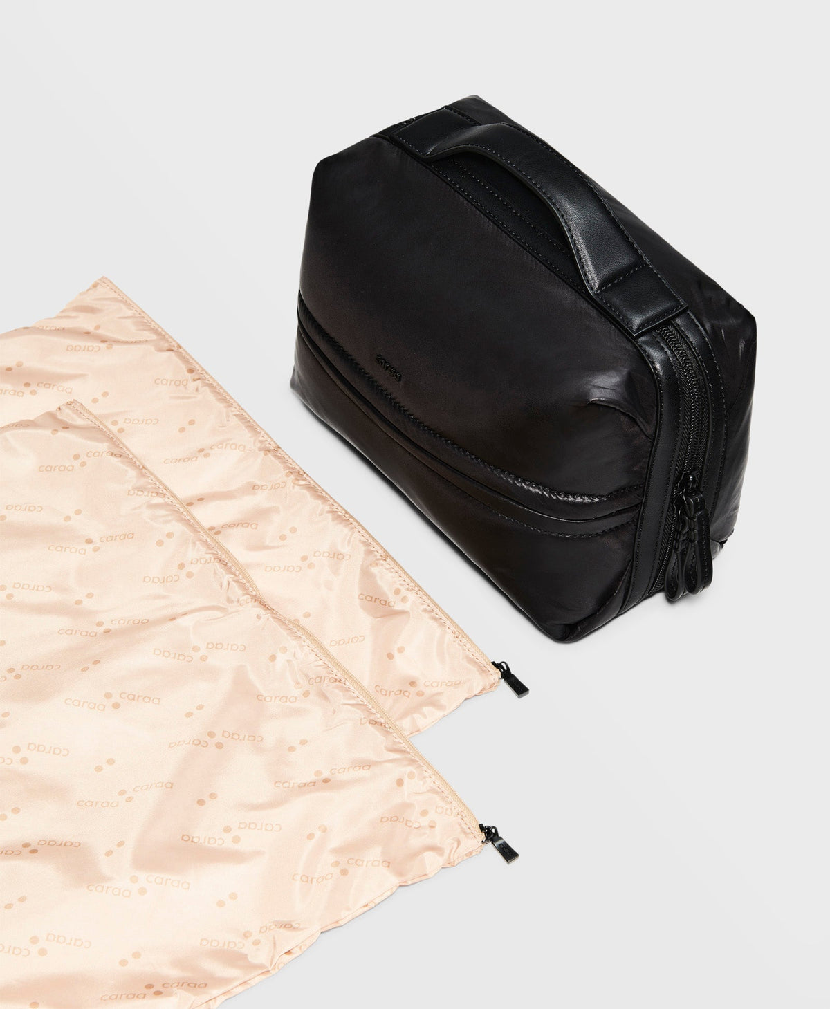 Caraa Travel Kit in Black with its two pouches