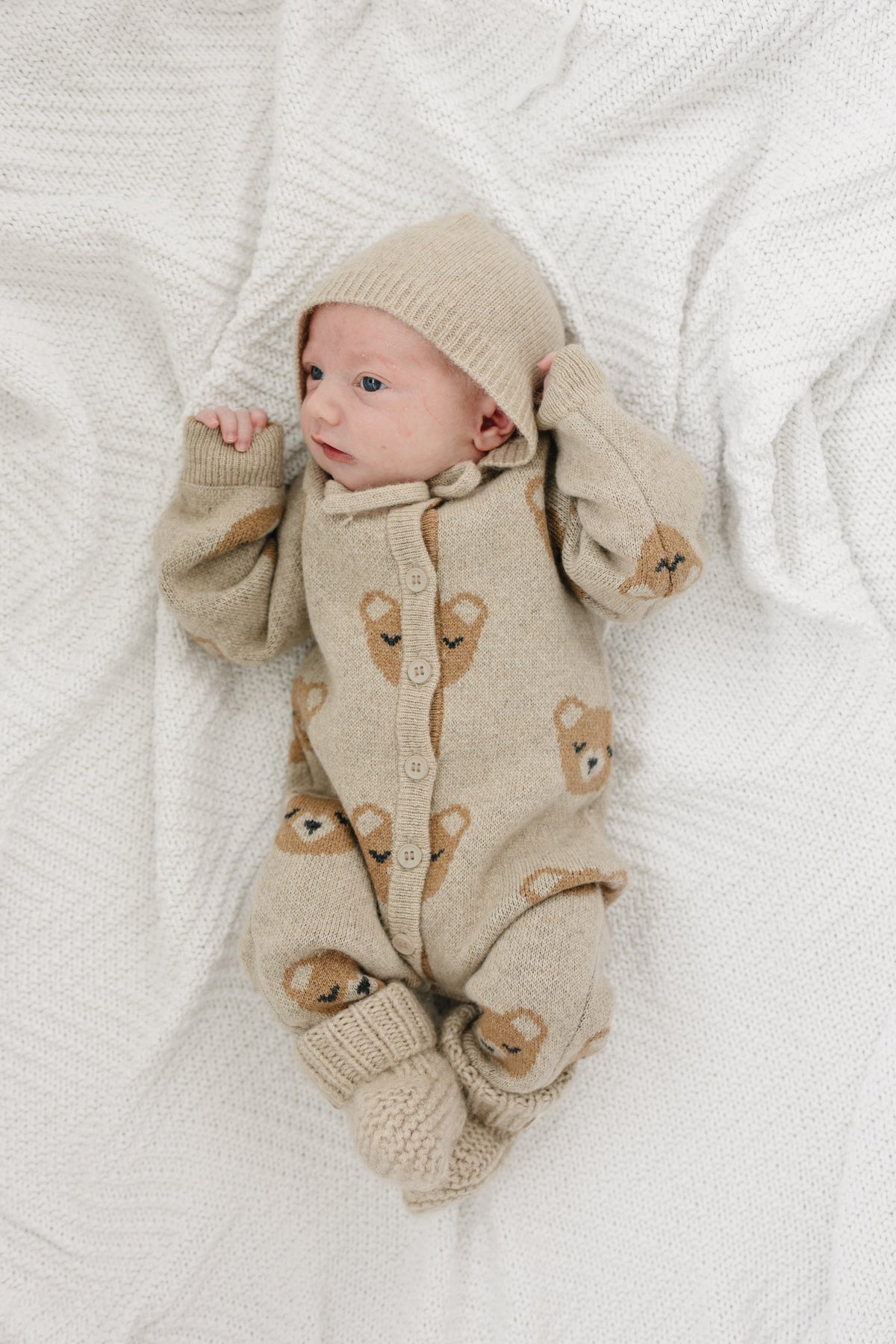 Bear Cashmere Set in brown, the jumpsuit, tie bonnet and booties laid out