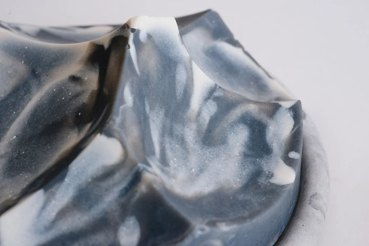 Erode Soap in Jasmine Ylang Ylang, shown on its dish