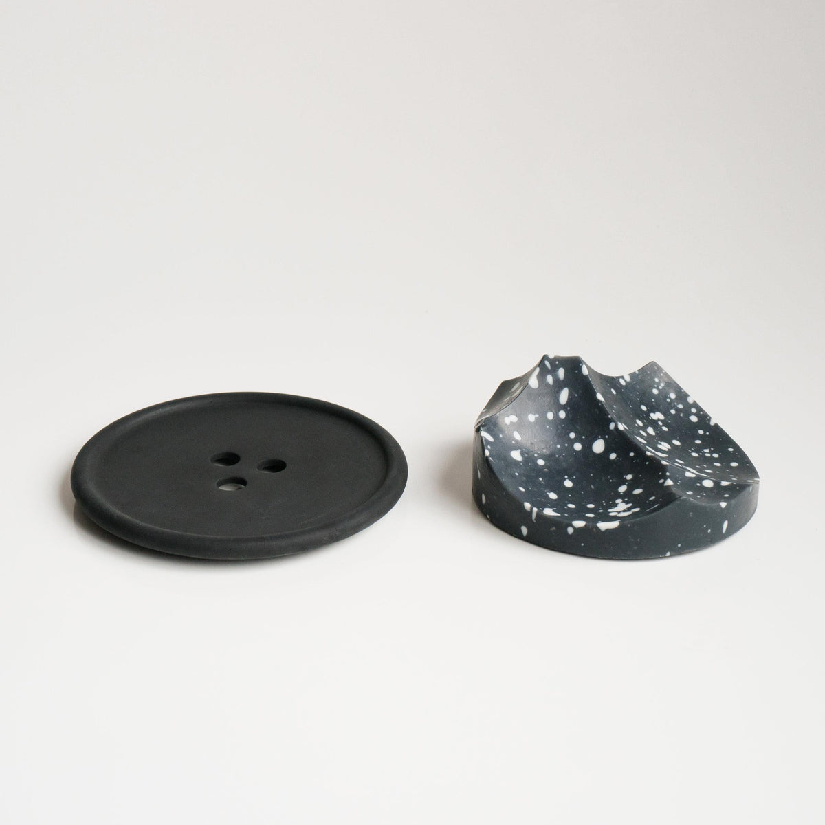 Erode Soap in Daily Detox, the black bar on its dish