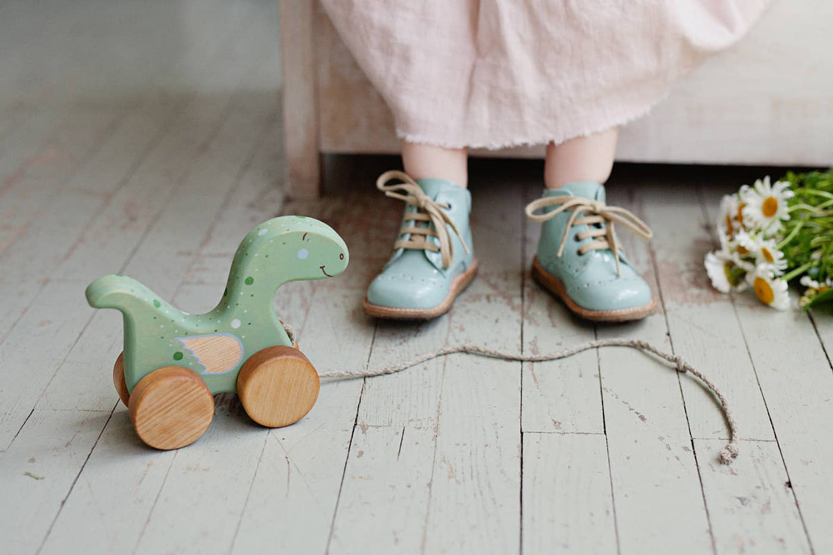 Handcrafted Birch Wood Dinosaur Pull Toy