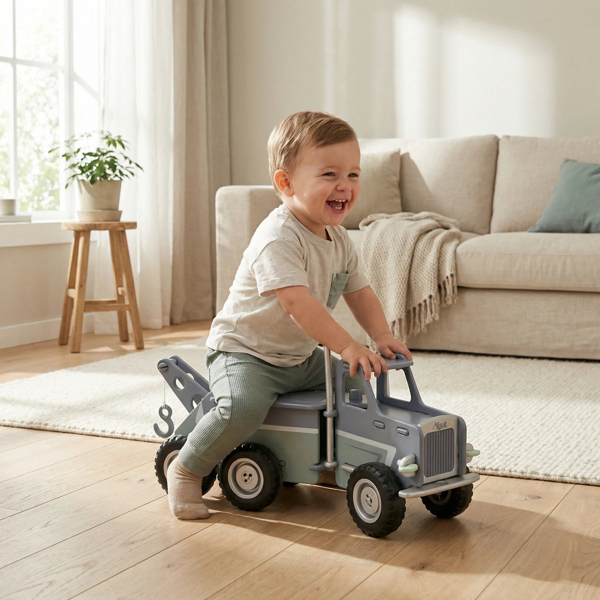 Child riding the Moover Mack truck