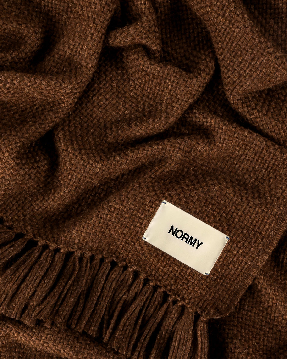 Normy Alpaca Wool Blanket in Cocoa, weave and label