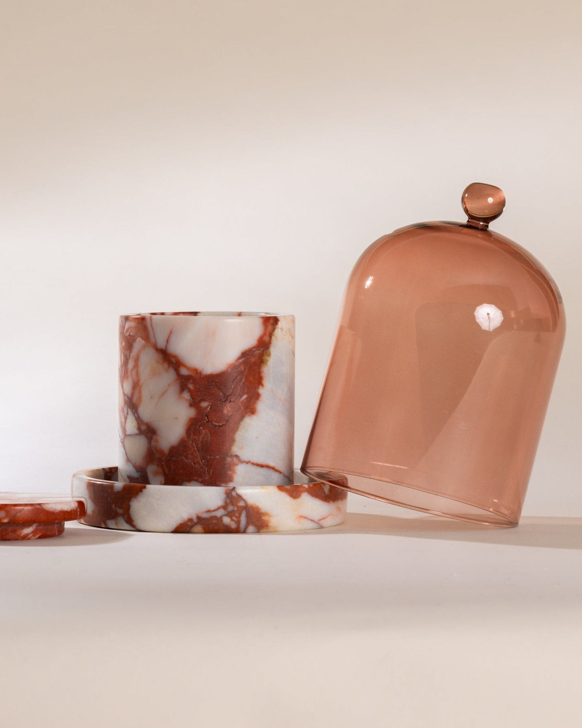 Poured New York Brick Cloche + Stone with a marble candle