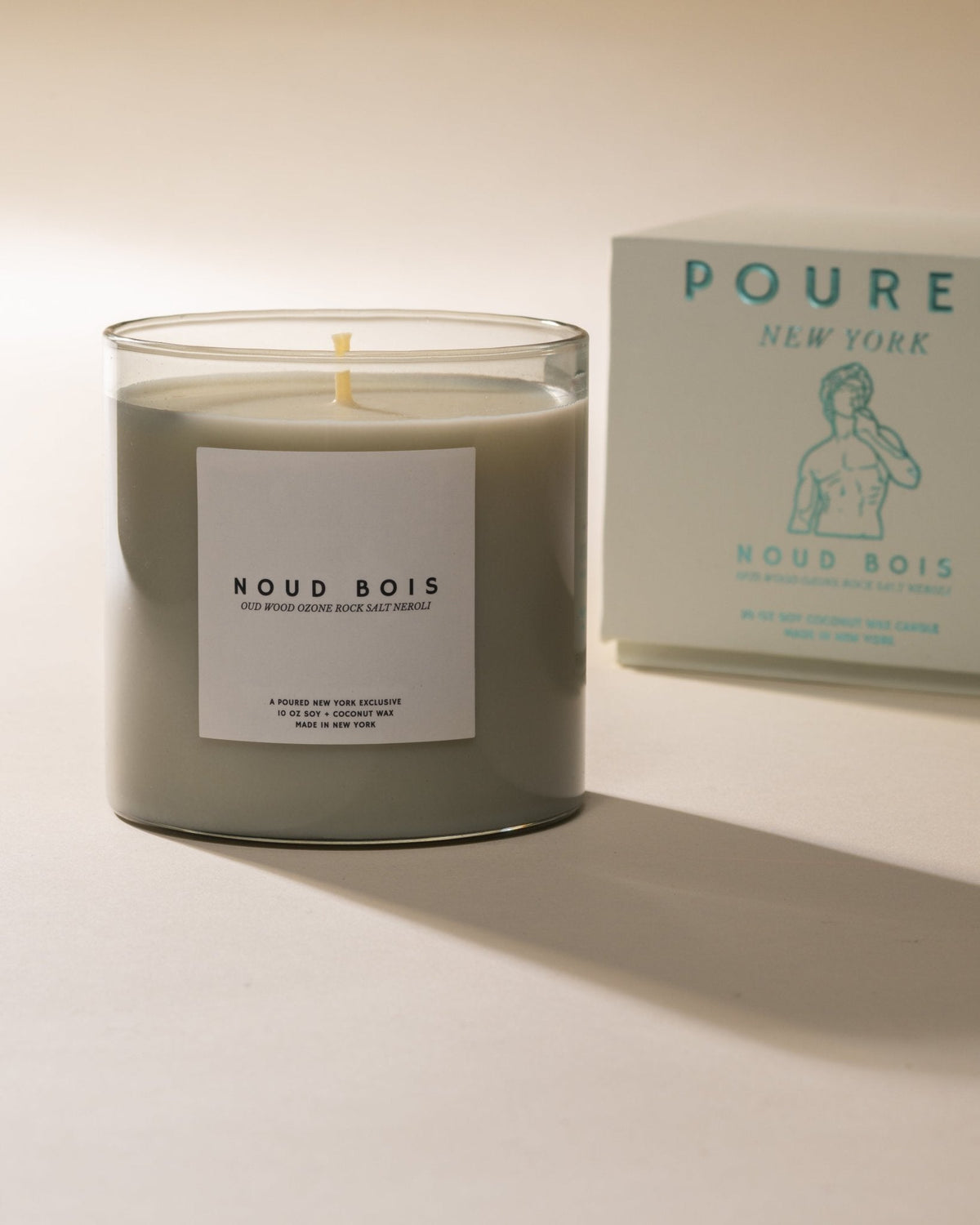 Poured New York Noud Bois candle with its box
