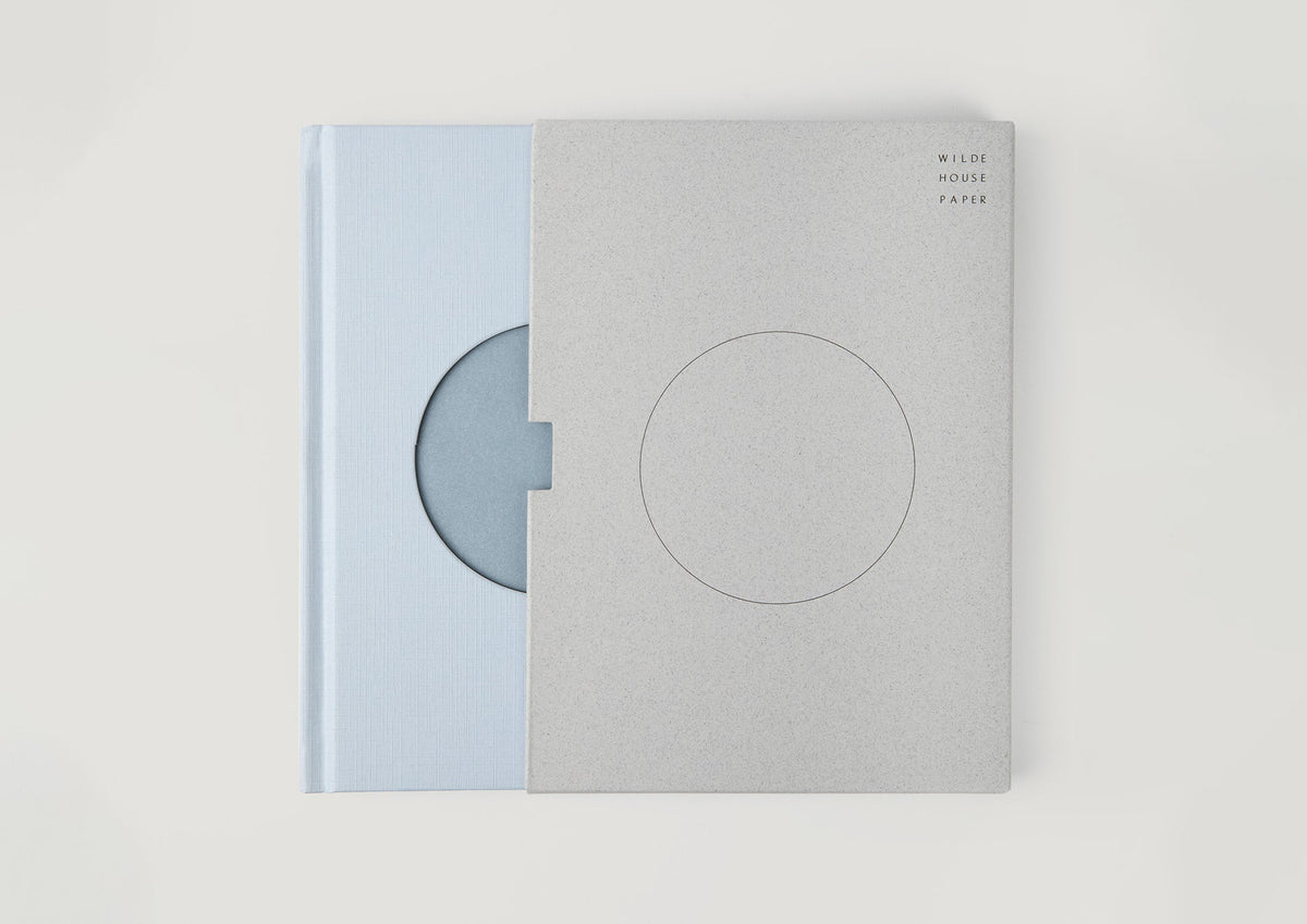 The journal with its recycled paper sleeve