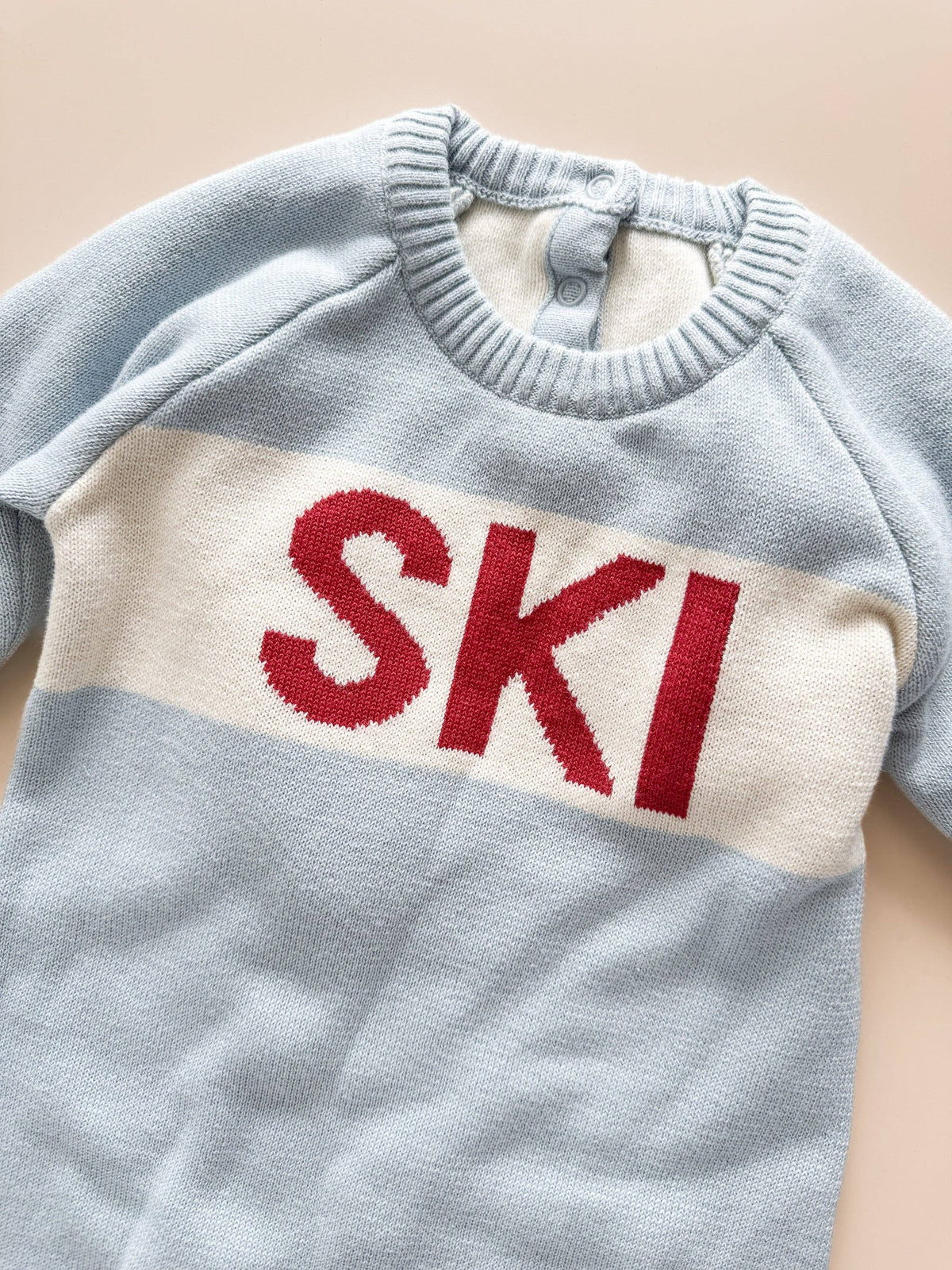 Ski sweater knit romper, back