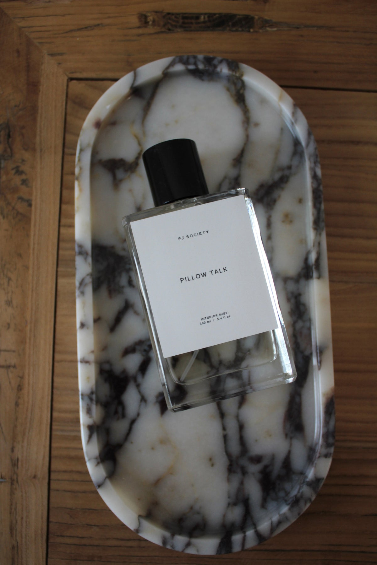 PJ Society The Interior Mist in Pillow Talk, on marble